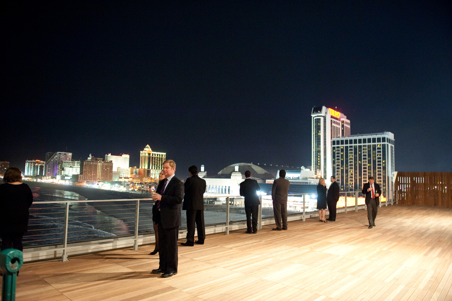 People standing on the Altantic One rooftop terrace overlooking the Atlantic City boardwalk
